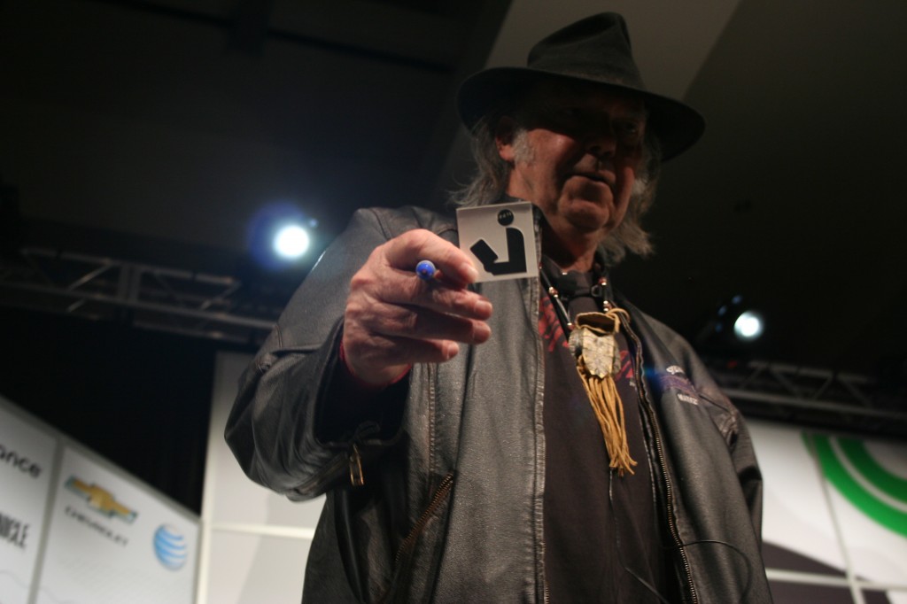 Neil Young holds library symbol at SXSW